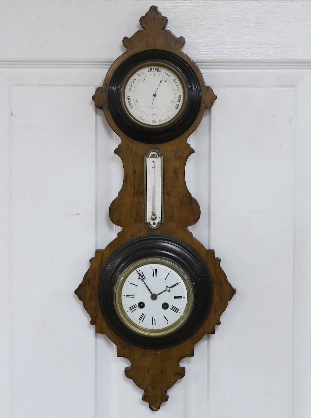 A French barometer with clock, 65cm high